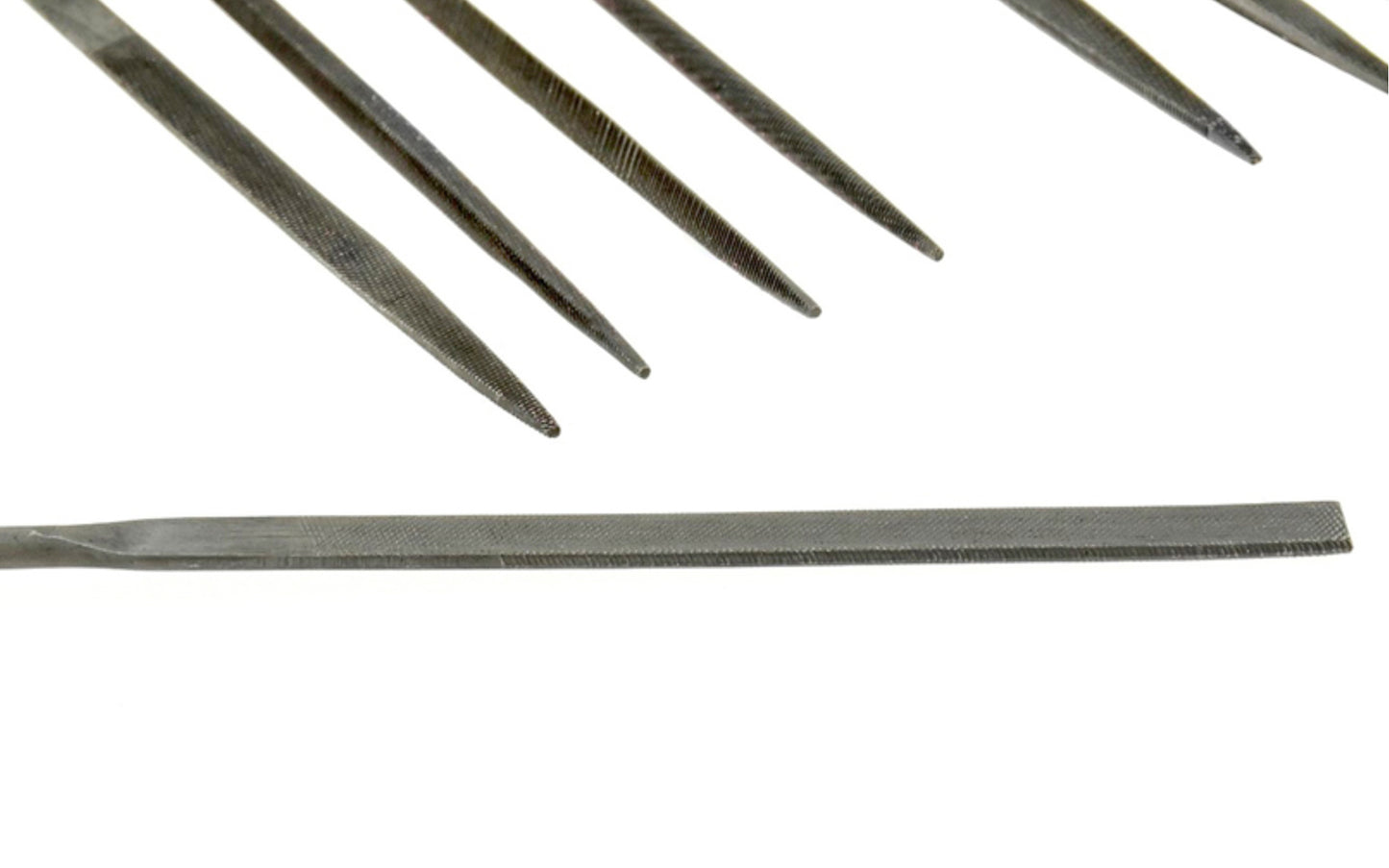 12-PC Fine Cut Needle File Set - 3 mm x 140 mm. Designed for removing, refining, reshaping, & scraping projects that require detail precision work. Shapes in set: (2) Round, (2) Equaling, Tapered Round, Half Round, Barrette, Crossing, Knife, Warding, Square, & Three Square. Made of bearing hardened steel.