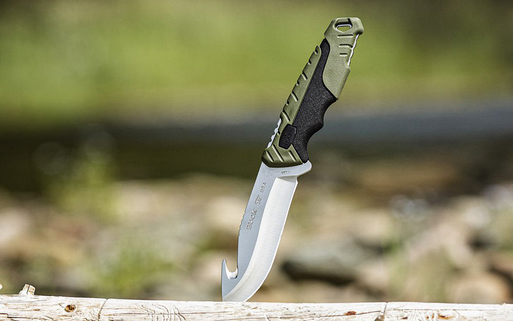 Buck Knives 657 Pursuit, Large Fixed Blade Knife with Guthook - Green is a multi-purpose alternative to traditional hunting knives, the hunting knife designed for the beginner to the experienced, serious hunter. Includes a polyester sheath. 4-1/2" long blade. Model 0657GRS-B. 033753147593