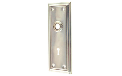 Brass Escutcheon Door Plate with Keyhole ~ Polished Nickel Finish ~ Vintage-style Hardware · Classic & traditional design ~ Quality stamped brass material ~ 6-7/8" high x 2-1/2" wide ~ For solid or pre-bored (2-1/8") hole doors