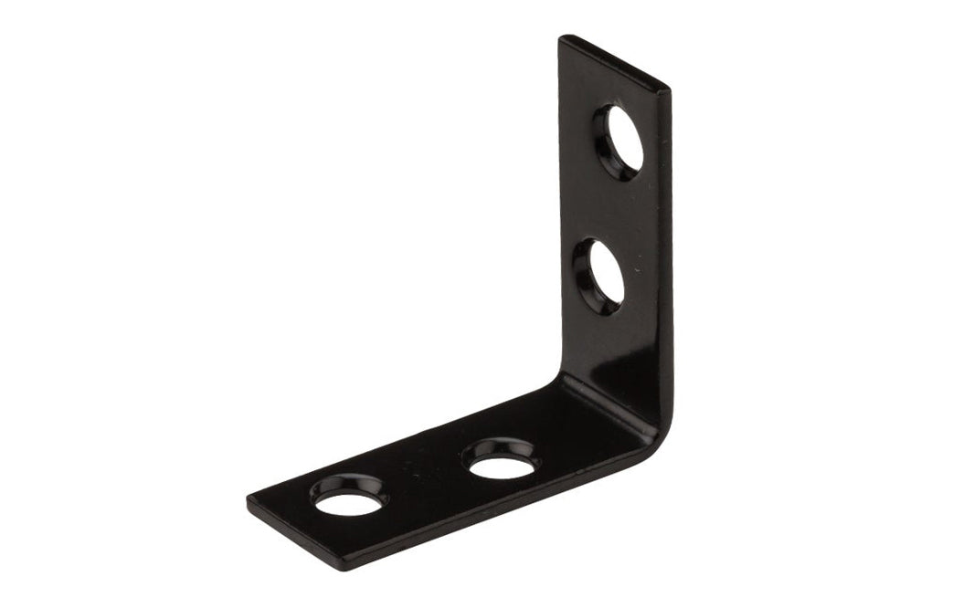 1-1/2" x 5/8" Black Finish Corner Brace ~ This Brace is designed for furniture, countertops, shelving support, chests, cabinets. Great for repair of many items & other home, workshop, & industrial applications. Made of steel material with a black finish. Single corner brace. National Hardware Model No. N266-480. 886780014549