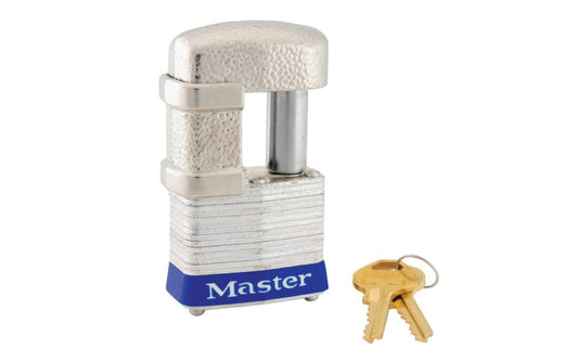 Master Lock Armored Trailer Lock with Shackle Guard. 1-9/16" wide laminated steel case. 4-pin tumbler. Revolving case-hardened shackle-guard. 4-pin cylinder helps prevent picking. Rust-resistant nickel-plated and armor. Shackle clearance, vertical 15/16", horizontal 7/16". Comes with 2 brass keys. Dual locking levers provide extra pry resistance. Resists saws and bolt cutters. For use with cables, chains or hasps. For guarding trailer on or off vehicle.