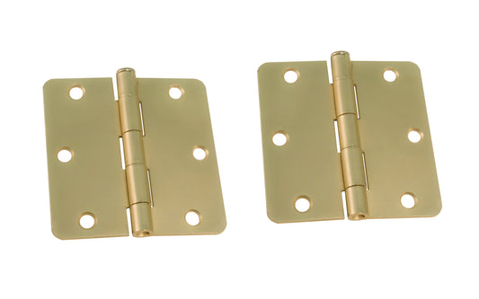 A pair of 3-1/2" Satin Brass Door Hinges with 1/4" radius corners & a removable pin. Satin Brass finish on steel material. Countersunk holes. Includes flat head screws. 3-1/2" x 3-1/2" door hinge size. Five knuckle, full mortise design. Ultra Hardware No. 35217.