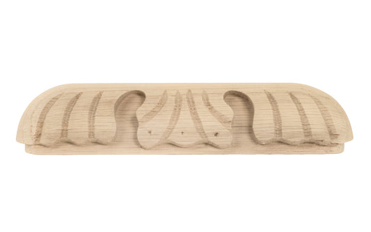 A traditional & intricate design carved oak wood handle pull with 5-1/2" on centers. Made of unfinished solid oak wood, this handle has a smooth feel & nice-looking grain to it. It may even be stained, painted, or varnished if desired. 5-1/2" spacing of screw holes. Solid oak pull.