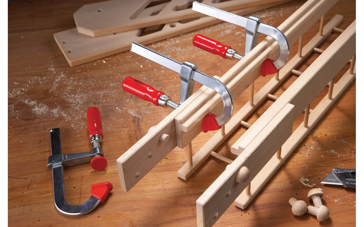 The Bessey U shaped bar clamps helps to clamp over small obstructions & apply the clamping force. Rail is made of quality steel drawn in a single piece for durability & strength. U-shape of the rail enables step-over clamping for hard-to-reach spaces. 8" max opening - 2" clamp depth - Model No. LMU2.008 - Light Duty