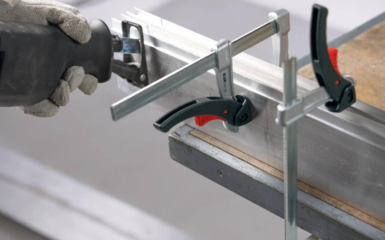 Bessey 4" "KliKlamp" Light Duty Lever Clamp KLI3.004 creates up to 260 lbs. of clamping force. Positive locking ratchet action. Made of sturdy magnesium which makes it lightweight & strong. Fixed arm with v-grooves holds round & angular components firmly in place. 4" clamping capacity - 3" throat depth. Made in Germany