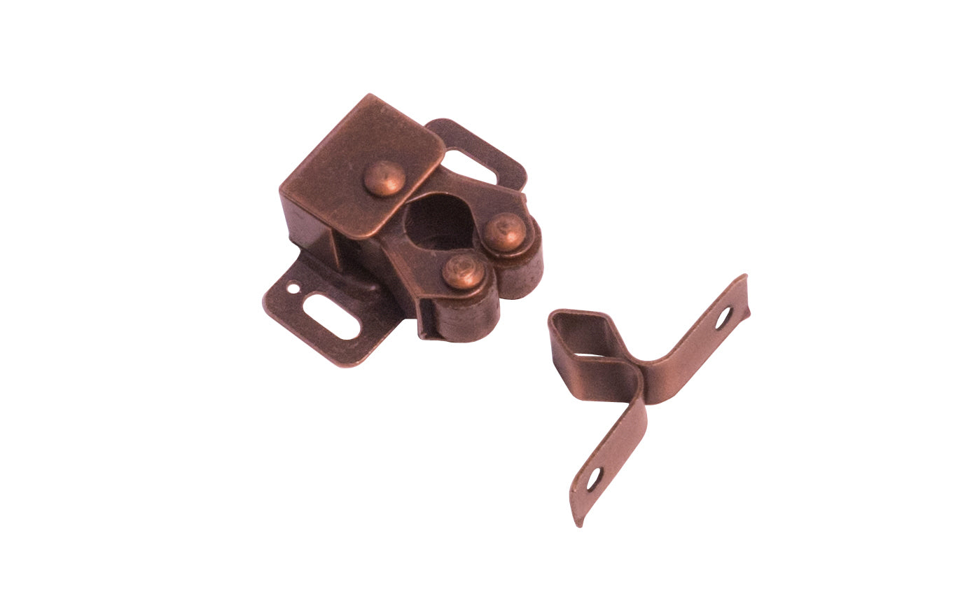 Antique Bronze Finish Double Roller Catch & Spear with self-aligning arms that work independently assuring easy action. Nylon rollers absorb shock & minimizing noise. Steel material with Statuary bronze finish. Includes Phillips screws. Laurey Hardware Model No. 04318. Double Rollers. Cabinet door catch. 722233043189.