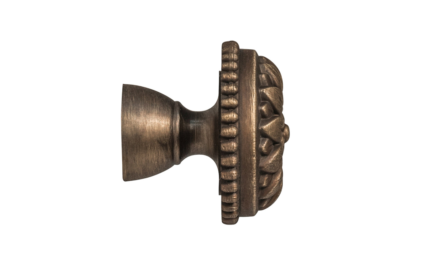 Traditional & classic "French Style" cabinet knob with an elegant flower design & beaded trim. Made of high quality solid brass, his knob has a weighty & durable feel. Great for cabinets, furniture & drawers. The knob is designed in the Late 19th Century style of hardware. Antique brass finish on solid brass material. Available in 1-1/8" diameter & 1-1/2" diameter