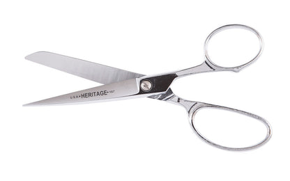 Heritage 7" Straight Trimmer Chrome-Plated Scissors. Hot forged cutlery. Precision ground scissor blades produce a sharp clean, uniform cut. Cutlery grade steel ensures blades stay sharp. Chrome over nickel-plated blades resists corrosion & rust. Cuts textiles, cardboard, plastics. Model 107-P. Trimmer made in USA.