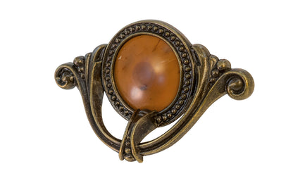 Waterfall-Style Drawer Pull With Bakelite ~ 4" on Centers. A special & unique drawer pull designed in the "Waterfall-style" / "Art Moderne" style of hardware popular in the 1930's. The handle pull is made of durable zinc material with an antique brass finish, & a bakelite insert inside. 4" on centers.