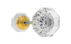 Pair of Classic Octagonal Clear Glass Doorknobs with spindle. A high quality & genuine glass doorknob set with an attractive octagon design. The sparkling center point under glass amplifies reflected light to showcase beautiful facets. Solid brass base. Reproduction Glass Door Knobs. Traditional Octagon Glass Knobs. Unlacquered brass (will patina naturally), Non-Lacquered Brass 