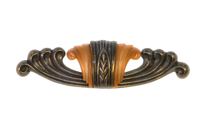 Waterfall-Style Drawer Pull With Bakelite ~ 4-1/4" on Centers. A special & unique drawer pull designed in the "Waterfall-style" / "Art Moderne" style of hardware popular in the 1930's. The handle pull is made of durable zinc material with an antique brass finish, & a bakelite insert inside. 4-1/4" on centers.