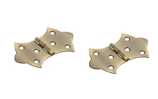 These solid brass hinges are designed to add a decorative appearance to small boxes, jewelry boxes, small lightweight cabinet doors, craft projects, etc. Made of solid brass material with an antique brass finish. 1-11/16" high x 3-1/16" wide. Surface mount. Non-removable pin. Sold as two hinges. National Hardware Model No. N211-854. 