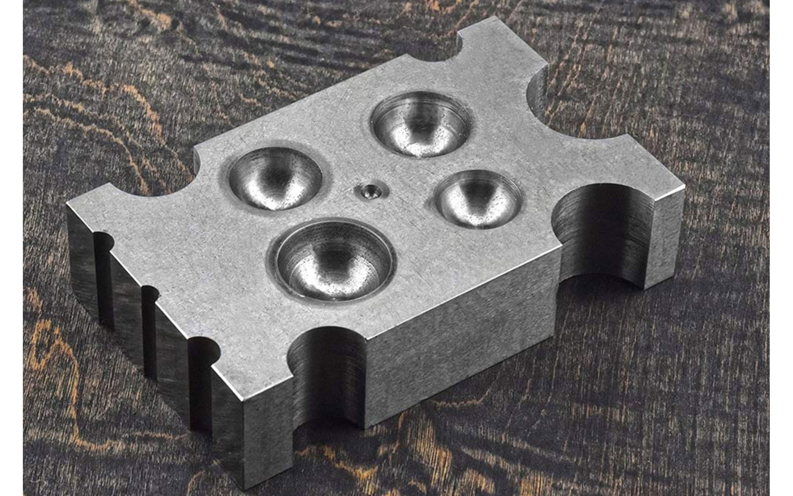 2-1/2" x 4" Steel Dapping Block. This steel dapping block is ideal for use by hobbyists, jewelers, and craftsmen for shaping metals & other materials in jewelry making, metalworking, & other applications. & 2-1/2" x 4" x 1" size.