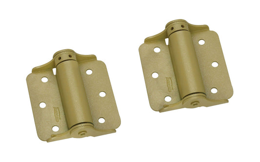 3" BakEnamel Brass Finish Steel Adjustment Spring Hinges ~ designed for screen doors & other lightweight utility doors. Full-surface application, no mortising is required. Strong fully enclosed spring. For use on either right hand or left hand doors. Stud pin adjusts to provide desired closing speed. N115-006.