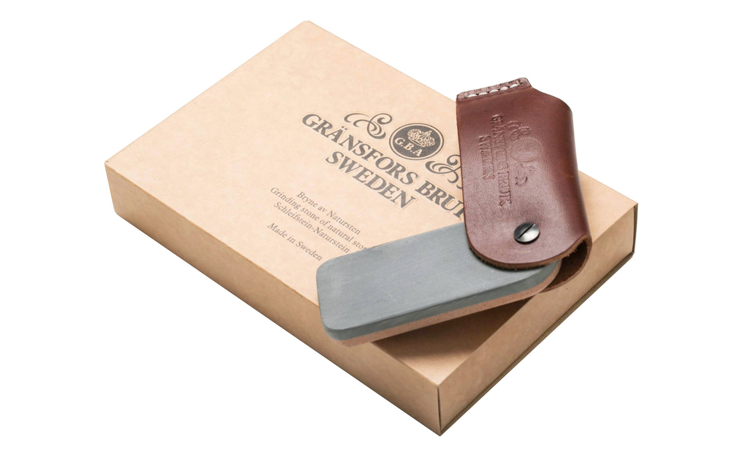 Made in Gränsfors, Sweden · No. 4035 Model ~ Natural Sharpening Whetstone with leather case. Two unique natural materials which are chosen to best supply the needs of coarse &amp; fine grinding. Made by Gränsfors Bruk.