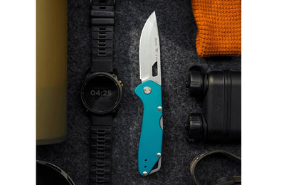 Buck Knives 724 Mustang Folding Knife - Blue color. Model 0724BLS-B. 3-1/4" long blade. Modern EDC knife. Made in USA.