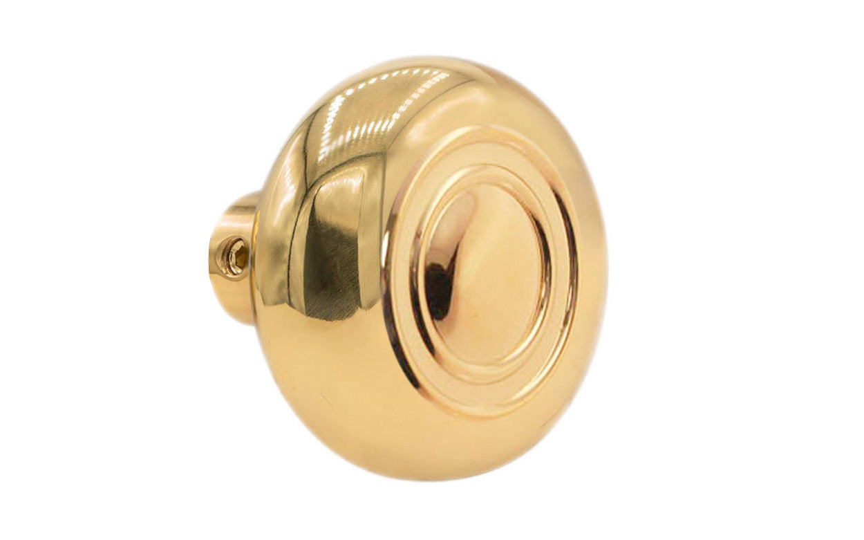 Single Classic Brass Circle-Ring Design Doorknob. Quality hollow core wrought brass doorknob with an attractive circle-ring design. Reproduction Brass Door Knob. Traditional Threaded Brass Knobs. Unlacquered Brass (will patina over time). Non-lacquered brass. Un-lacquered brass.
