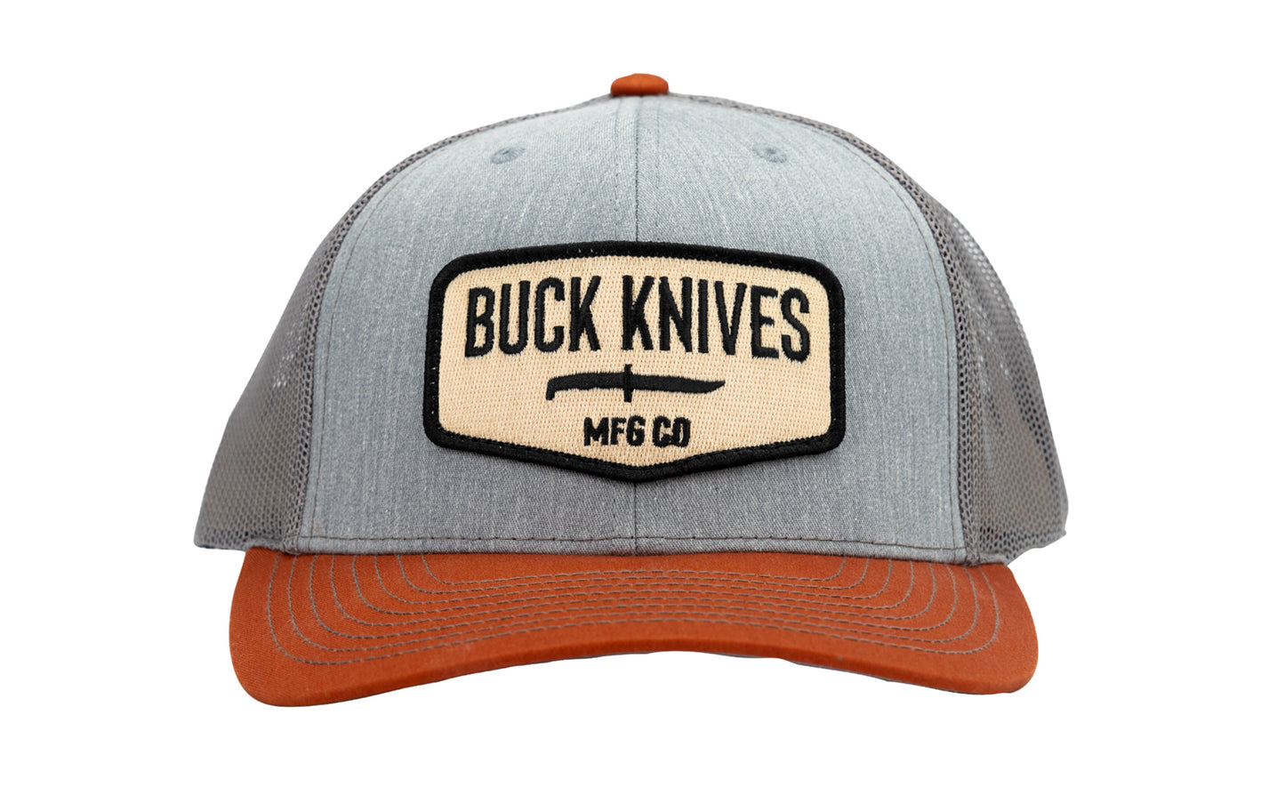 Buck Knives Hat 'Richardson 112 six-panel trucker hat' in heather gray/charcoal/dark orange with woven patch. Front: 60% Cotton/40% Polyester. Back: 100% Polyester. Potton-polyester twill with trucker mesh. Snapback closure, adjustable fit. Buck Knives Ball Cap Hat.