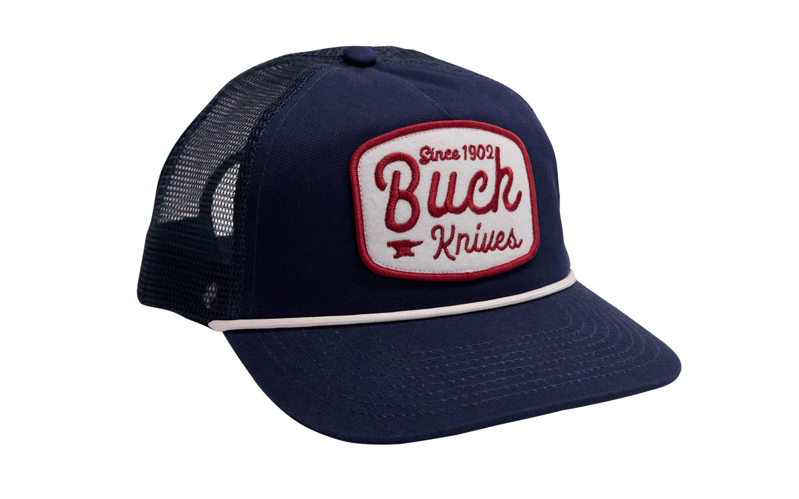 Buck Knives Five-panel snapback trucker hat in navy with white and red rounded Buck Knives felt patch and white rope. Low-profile with pre-curved bill. Navy twill and navy mesh. Snapback closure, adjustable fit. One size fits most. Buck Knives Ball Cap Hat.