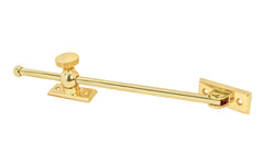 Vintage-style Classic & Premium Solid Brass Casement Adjuster Stay ~ 10" Length. For securing outswing casement windows. It has a durable pivot turn with a knurled knob for smooth & secure operation. Lacquered Brass Finish