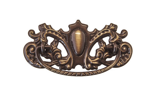 Brass Victorian Drop Pull ~ 3" On Centers - Antique Brass Finish ~ Vintage-style Hardware · Traditional & classic ~ Made of high quality solid brass material ~ 3" spacing of screw holes ~ Includes an ornate stamped brass backplate ~ Designed in a traditional Victorian style, but suitable for different traditional & period decors ~ Ornate style