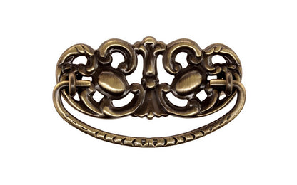 Brass Victorian Drop Pull ~ 3" On Centers - Antique Brass Finish ~ Vintage-style Hardware · Traditional & classic ~ Made of high quality solid brass material ~ 3" spacing of screw holes ~ Includes an ornate stamped brass backplate ~ Designed in a traditional Victorian style, but suitable for different traditional & period decors ~ Ornate style