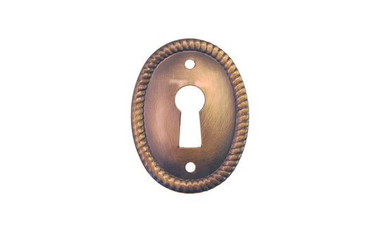 Stamped Brass Vertical Oval Keyhole ~ Antique Brass Finish