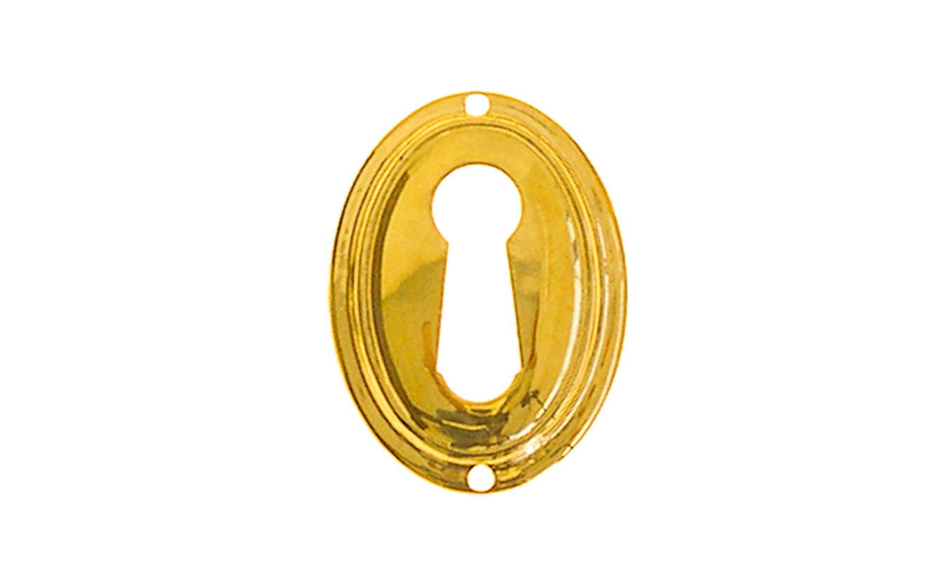 Vintage-style Hardware · An attractive & stylish Stamped Brass Vertical Oval Keyhole piece made of quality stamped brass material with a nice trim. This keyhole will certainly add character & style to your cabinets, drawers, & furniture. Traditional & classic. Non-lacquered brass