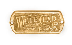 Vintage-Style Hardware - Classic & traditional "White Clad" name plate designed for ice box cabinets. Made of solid brass material, it is a thick & good-looking piece of hardware & a nice addition to your icebox cabinets. The plate is designed in the Late 19th Century, Early 20th Century style hardware. Unlacquered Brass (will patina over time). Un-Lacquered Brass. Non-Lacquered Brass.