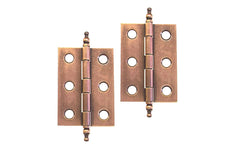 Traditional & classic ball-tip steel cabinet hinges. 2" high x 1-7/16" wide. Steel material with a plated finish. Antique Copper Finish.