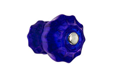 Vintage-style Hardware · Classic & original-style fluted glass cabinet knob with a silver pan head thru-bolt. Made of genuine glass. Cobalt Blue color glass. Includes a silver pan thru-bolt. Reproduction fluted classic glass knob. Traditional fluted glass knob. 1-1/4" Diameter