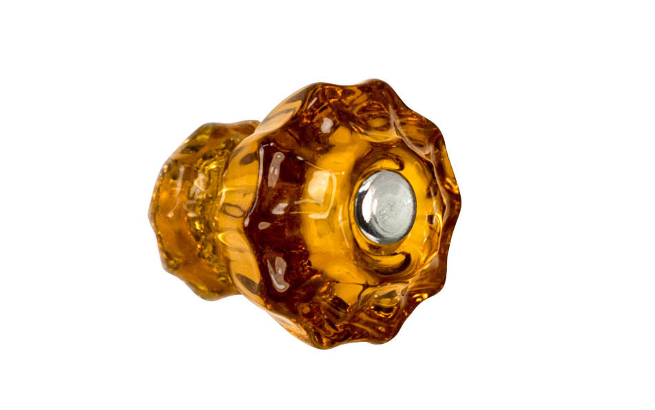 Vintage-style Hardware · Classic & original-style fluted glass cabinet knob with a silver pan head thru-bolt. Made of genuine glass. Amber color glass. Includes a silver pan thru-bolt. Reproduction fluted classic glass knob. Traditional fluted glass knob.  1-1/4