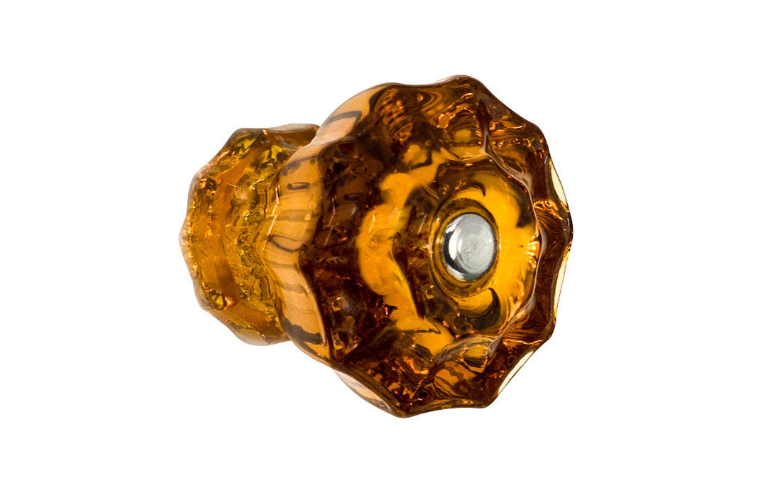 Vintage-style Hardware · Classic & original-style fluted glass cabinet knob with a silver pan head thru-bolt. Made of genuine glass. Amber color glass. Includes a silver pan thru-bolt. Reproduction fluted classic glass knob. Traditional fluted glass knob. 1-1/2