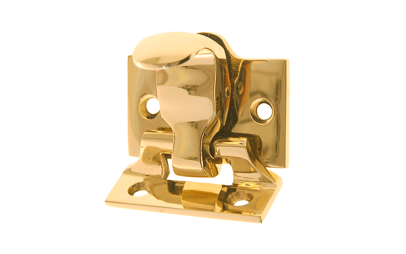 High quality Forged bronze spring-loaded sash lock & lift; made of quality forged bronze material for durability. This latch combines both a locking mechanism & window lift in one unit. Lacquered Brass Finish.