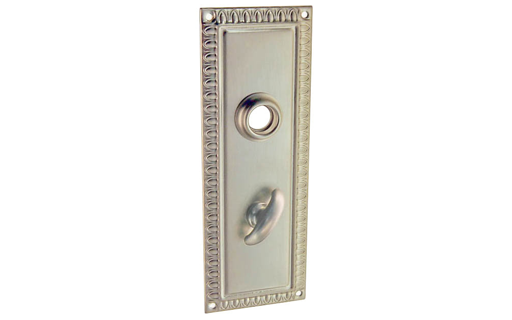 Brass Escutcheon Door Thumb Turn Plate ~ Brushed Nickel Finish ~ Vintage-style Hardware · Decorative beaded design ~ Quality stamped brass material ~ 7" high x 2-1/2" wide ~ For solid or pre-bored (2-1/8") hole doors