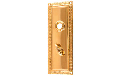 Brass Escutcheon Door Thumb Turn Plate ~ Lacquered Brass Finish ~ Vintage-style Hardware · Decorative beaded design ~ Quality stamped brass material ~ 7" high x 2-1/2" wide ~ For solid or pre-bored (2-1/8") hole doors