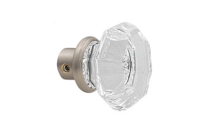 Single Classic Octagonal Clear Glass Doorknob. A high quality & genuine glass doorknob with an attractive Octagon design. The sparkling center point under glass amplifies reflected light to showcase beautiful facets. Solid brass base. Reproduction Glass Door Knobs. Traditional Octagonal Glass Knobs. One knob. Brushed Nickel Finish