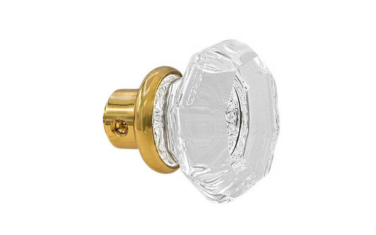 Single Classic Octagonal Clear Glass Doorknob. A high quality & genuine glass doorknob with an attractive Octagon design. The sparkling center point under glass amplifies reflected light to showcase beautiful facets. Solid brass base. Reproduction Glass Door Knobs. Traditional Octagonal Glass Knobs. One knob. Unlacquered brass (will patina naturally), Non-Lacquered Brass.