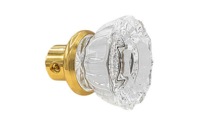 Single Classic Fluted Clear Glass Doorknob. A high quality & genuine glass doorknob with an attractive fluted design. The sparkling center point under glass amplifies reflected light to showcase beautiful facets. Solid brass base. Reproduction Glass Door Knobs. Traditional Fluted Glass Knobs. One knob. Lacquered Brass Finish.