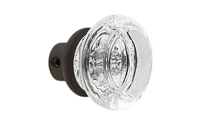 Single Classic Round Clear Glass Doorknob. A high quality & genuine glass doorknob with an attractive round design. The sparkling center point under glass amplifies reflected light to showcase beautiful facets. Solid brass base. Reproduction Glass Door Knobs. Traditional Round Glass Knobs. One knob. Oil Rubbed Bronze Finish.