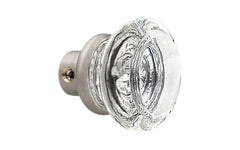 Single Classic Round Clear Glass Doorknob. A high quality & genuine glass doorknob with an attractive round design. The sparkling center point under glass amplifies reflected light to showcase beautiful facets. Solid brass base. Reproduction Glass Door Knobs. Traditional Round Glass Knobs. One knob. Brushed Nickel Finish.