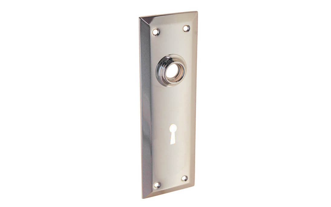 Brass Escutcheon Door Plate with Keyhole ~ Polished Nickel Finish ~ A classic & handsome door escutcheon plate with a keyhole. Made of quality stamped brass material, this escutcheon plate is a well-made & durable piece of hardware. The plate may be used on modern doors with 2-1/8" pre-bored holes, or with the old-style mortise lock sets on traditional doors as well. 