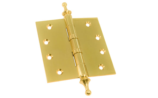 Lacquered solid brass 4" x 4" square corner door hinges with finial tips. Sold as two hinges in pack and includes fasteners. Lacquered finish on solid brass material. Heavy extruded brass. Threaded button-tip finials.  Made by Ultra Hardware.