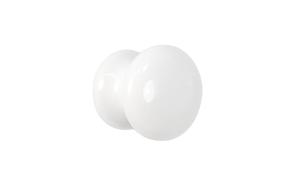 A classic & traditional white porcelain cabinet knob. Made of quality & genuine porcelain material, this stylish knob has a smooth & attractive look & feel. This round knob works well in kitchens, bathrooms, on furniture, cabinets, drawers, & other uses. 1" Diameter Knob