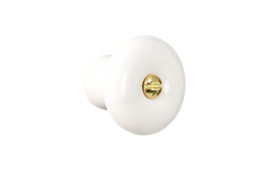 A classic & traditional white porcelain round cabinet knob. Made of quality porcelain, this stylish knob has a smooth & attractive look & feel. Works well in kitchens, bathrooms, on furniture, cabinets, drawers. White Porcelain Knob with Brass Screw Bolt. 1-1/4