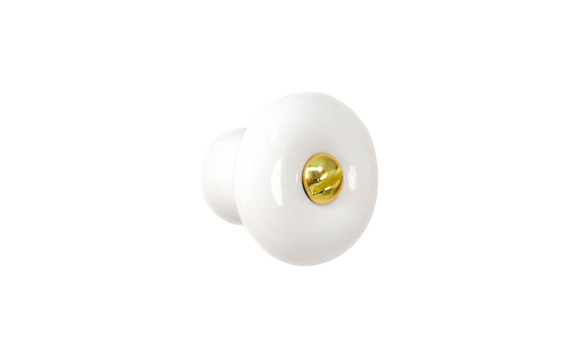 A classic & traditional white porcelain round cabinet knob. Made of quality porcelain, this stylish knob has a smooth & attractive look & feel. Works well in kitchens, bathrooms, on furniture, cabinets, drawers. White Porcelain Knob with Brass Screw Bolt. 1