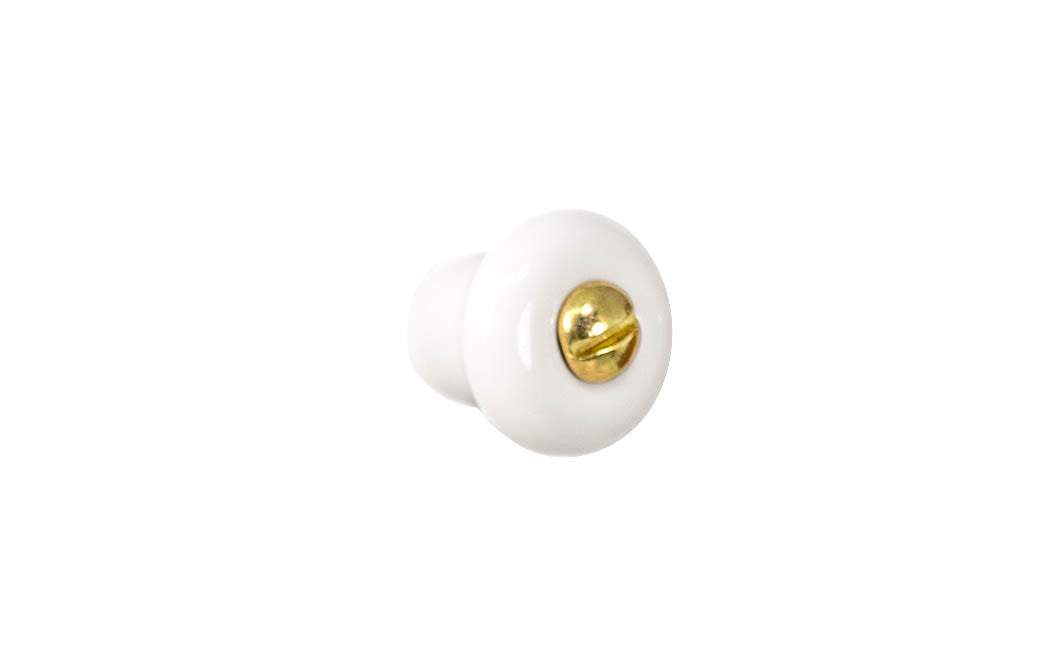 A classic & traditional white porcelain round cabinet knob. Made of quality porcelain, this stylish knob has a smooth & attractive look & feel. Works well in kitchens, bathrooms, on furniture, cabinets, drawers. White Porcelain Knob with Brass Screw Bolt. 3/4" Diameter Knob