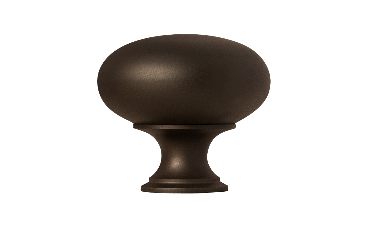 Vintage-style Hardware · Traditional & Classic Brass Knob with an Oil Rubbed Bronze Finish. 1-1/2" diameter size knob. Made of high quality brass, this stylish round cabinet knob has a smooth look & feel on a pedestal shaped base. Works great in kitchens, bathrooms, on furniture, cabinets, drawers. Authentic reproduction hardware. 