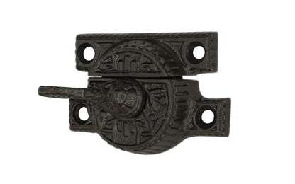 Victorian cast iron crescent-style sash lock designed for sash or hung windows. This lock is formed of cast iron material with a durable pivot turn. The turn will lock & tighten your windows securely in place. Vintage cast iron finish. - Model 088457