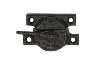 Victorian cast iron crescent-style sash lock designed for sash or hung windows. This lock is formed of cast iron material with a durable pivot turn. The turn will lock & tighten your windows securely in place. Vintage cast iron finish. - Model 088457
